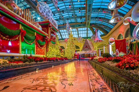 Holiday-themed installation inside the Bellagio Conservatory with Christmas decorations and seasonal displays